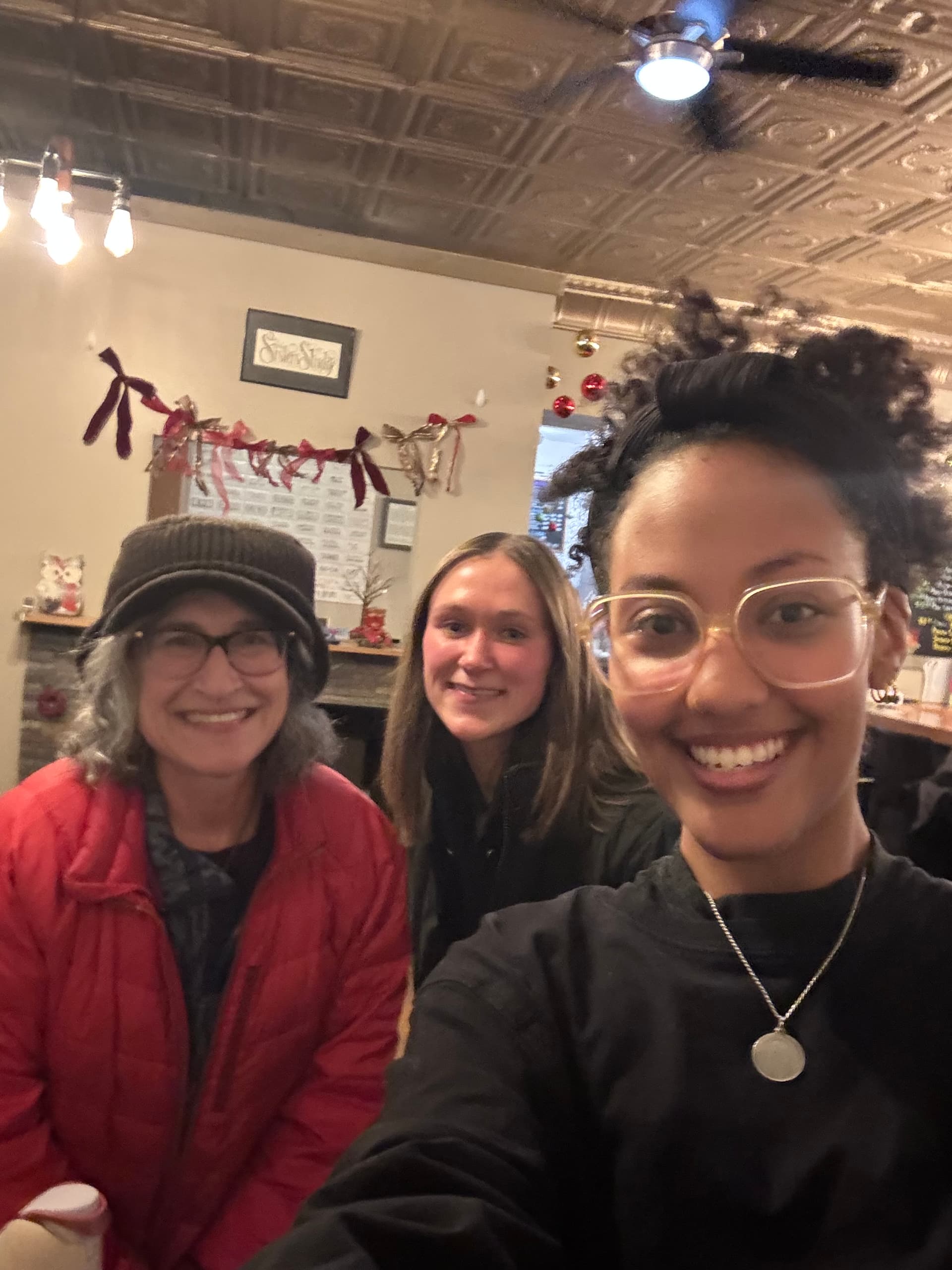 Selam at her favorite South Minneapolis coffee shop with writer's group attendees